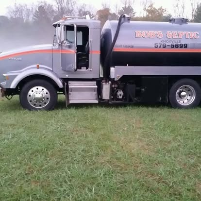 Bob's Septic Service truck on a customer's property